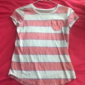 A pink and white striped shirt